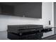 Flat screen TV with cable box and remote control at 4803 Brier Rose Ln, Kissimmee, FL 34746