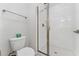 Clean bathroom with a shower and toilet at 4803 Brier Rose Ln, Kissimmee, FL 34746