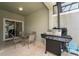 Outdoor patio with a grill and table for dining at 4803 Brier Rose Ln, Kissimmee, FL 34746