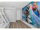 bedroom with Frozen mural and bunk beds at 4803 Brier Rose Ln, Kissimmee, FL 34746