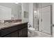 Clean bathroom with granite countertop and glass shower at 4803 Brier Rose Ln, Kissimmee, FL 34746