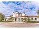 Community clubhouse featuring architectural details and landscaping at 8926 Zurich Ln, Kissimmee, FL 34747