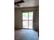 Bright bedroom with sliding door to balcony at 2860 N Powers Dr # 14, Orlando, FL 32818