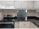 Kitchen with granite countertops and stainless steel appliances at 2860 N Powers Dr # 14, Orlando, FL 32818