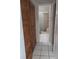 Hallway bathroom with tiled floors and shower at 2860 N Powers Dr # 14, Orlando, FL 32818