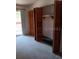 Bedroom with double door closet and carpeting at 2860 N Powers Dr # 14, Orlando, FL 32818