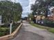Gated entrance to the community with landscaping at 2860 N Powers Dr # 14, Orlando, FL 32818