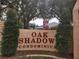 Oak Shadow Condominium entrance with gated access at 2860 N Powers Dr # 14, Orlando, FL 32818