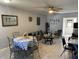 Dining area with table and chairs, open to living room at 241 N Hill Ave, Deland, FL 32724
