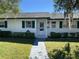 Charming single-story home with green landscaping at 241 N Hill Ave, Deland, FL 32724