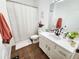 Clean bathroom with tub shower and updated vanity at 4865 Cypress Woods Dr # 2204, Orlando, FL 32811