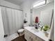 Clean bathroom with tub shower and updated vanity at 4865 Cypress Woods Dr # 2204, Orlando, FL 32811