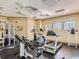 Well-equipped fitness center with various exercise machines at 4865 Cypress Woods Dr # 2204, Orlando, FL 32811