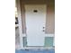 Private storage unit with a white door at 4865 Cypress Woods Dr # 2204, Orlando, FL 32811