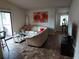 Living Room with light beige couch and tile floor at 3038 Antique Oaks Cir # 166, Winter Park, FL 32792
