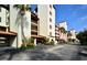 Condo building with covered parking and landscaping at 645 Marina Point Dr # 6450, Daytona Beach, FL 32114