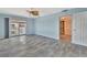 Spacious bedroom with balcony access and updated flooring at 645 Marina Point Dr # 6450, Daytona Beach, FL 32114