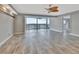 Large living room with tile floors and water views at 645 Marina Point Dr # 6450, Daytona Beach, FL 32114