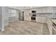 Updated kitchen featuring white cabinets and granite countertops at 645 Marina Point Dr # 6450, Daytona Beach, FL 32114