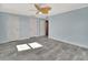 Spacious bedroom with tiled floors, multiple doors and a ceiling fan at 645 Marina Point Dr # 6450, Daytona Beach, FL 32114