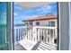 Spacious balcony overlooking water views and neighboring buildings at 645 Marina Point Dr # 6450, Daytona Beach, FL 32114
