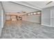 Open living space with tile floors and kitchen access at 645 Marina Point Dr # 6450, Daytona Beach, FL 32114
