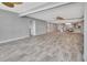 Open concept living area with tile floors and kitchen access at 645 Marina Point Dr # 6450, Daytona Beach, FL 32114