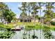 Lovely lakefront home with dock and trees at 16837 Arrowhead Blvd, Winter Garden, FL 34787