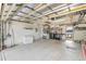 Spacious garage with laundry facilities and extra storage at 16837 Arrowhead Blvd, Winter Garden, FL 34787