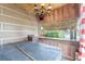 Relax in this covered hot tub, complete with a chandelier and lake views at 16837 Arrowhead Blvd, Winter Garden, FL 34787