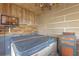 Enjoy this indoor hot tub with a TV and rustic decor at 16837 Arrowhead Blvd, Winter Garden, FL 34787