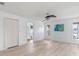 Bright main bedroom with wood-look floors and en-suite bathroom at 16837 Arrowhead Blvd, Winter Garden, FL 34787