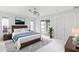 Spacious main bedroom with wood flooring and access to a patio at 16837 Arrowhead Blvd, Winter Garden, FL 34787