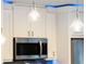 Pendant lighting above kitchen island at 16837 Arrowhead Blvd, Winter Garden, FL 34787