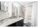 Updated bathroom features a large vanity, soaking tub, and modern fixtures at 16837 Arrowhead Blvd, Winter Garden, FL 34787