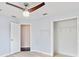 Light and airy bedroom with ceiling fan and double door closet at 16837 Arrowhead Blvd, Winter Garden, FL 34787