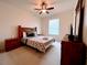 Cozy bedroom with a queen-size bed and plenty of closet space at 2302 Silver Palm Dr # 301, Kissimmee, FL 34747