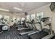 Well-equipped fitness center with treadmills, ellipticals, and weight machines at 2302 Silver Palm Dr # 301, Kissimmee, FL 34747