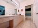 Clean bathroom with double vanity and shower/tub combo at 2302 Silver Palm Dr # 301, Kissimmee, FL 34747