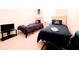 Bedroom with twin beds, TV, and plenty of space at 2302 Silver Palm Dr # 301, Kissimmee, FL 34747