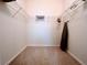 Large walk-in closet with wire shelving for storage at 2302 Silver Palm Dr # 301, Kissimmee, FL 34747