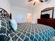 King-size bed in bedroom with ensuite bathroom access at 2302 Silver Palm Dr # 301, Kissimmee, FL 34747