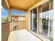 Private balcony with sliding glass doors and view at 702 Calabria Ave, Davenport, FL 33897