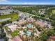 Resort community with pools, parking, and surrounding landscape at 702 Calabria Ave, Davenport, FL 33897