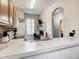 Small kitchen with white countertops and wood cabinets at 702 Calabria Ave, Davenport, FL 33897