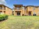 Spacious backyard with grassy area, ideal for outdoor activities at 702 Calabria Ave, Davenport, FL 33897