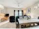 Bright dining room features a large wooden table with seating for six and a kitchen pass-through at 702 Calabria Ave, Davenport, FL 33897
