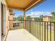 Private balcony overlooks community, offering scenic views and outdoor space at 702 Calabria Ave, Davenport, FL 33897