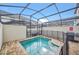 Private pool with patio and grilling area at 1616 Carey Palm Cir, Kissimmee, FL 34747
