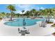 Resort-style community pool with ample seating at 1616 Carey Palm Cir, Kissimmee, FL 34747